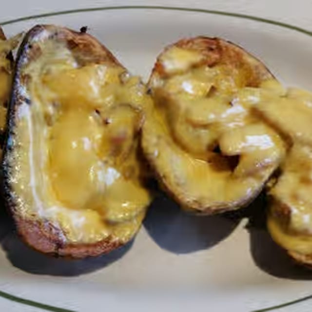 Potato Skins with Cheese and Bacon Bits.